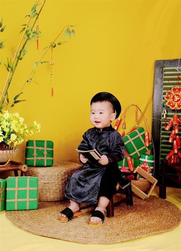 Ảnh tết bé trai cười tươi